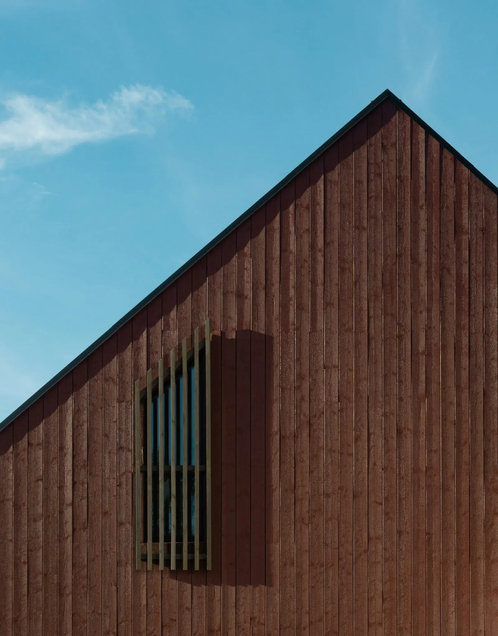 Gable end of a building clad in vertical timber boards